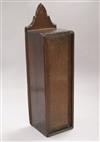 A late Georgian oak candle box width 11cm height 38cm                                                                                  