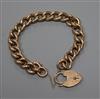 A 9ct gold curb link bracelet.                                                                                                         