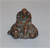 An Oriental patinated metal figure group 6cm high                                                                                      