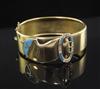 A Victorian gold, blue enamel and old cut diamond set hinged "buckle" bracelet,                                                        