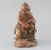 A Chinese bamboo figure of a fisherman, late 19th/early 20th century, H. 23.5cm                                                        