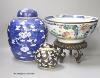 A 19th century Chinese porcelain prunus jar and cover, 27cm, on carved wood stand, a smaller famille noire jar and cover, a Chinese export fruit bowl, blue and white dish and a similar jar and cover 27cm                 