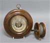 A J. Marshall fishing reel and an aneroid barometer                                                                                    