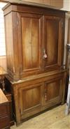 A 19th century French two part oak cupboard W.145cm                                                                                    