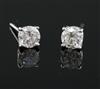 A pair of 18ct white gold and solitaire diamond ear studs,                                                                             