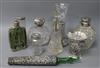 A collection of silver-mounted toilet jars, perfume flasks and flower vases, etc.,                                                     