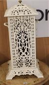 A late 19th century French white painted cast iron stove W.35cm                                                                        