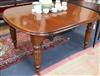 A Victorian mahogany extending dining table, on turned fluted legs 238cm extended (two spare leaves)                                   