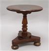 A Victorian miniature mahogany circular topped dining table                                                                            