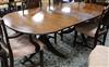 A Regency style mahogany two pillar dining table, one spare leaf W.216cm                                                               