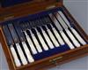 A Victorian cased set of twelve pairs of mother of pearl handled silver fruit eaters, by Francis Higgins II,                           