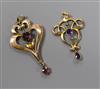 Two Edwardian Art Nouveau yellow metal and gem set drop pendants, one stamped 9ct, largest 42mm.                                       