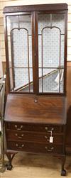 A 1920's George III style mahogany bureau bookcase W.75cm                                                                              