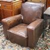 A pair of French leather club armchairs                                                                                                