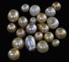 Twenty one loose undrilled natural saltwater pearls with Gem & Pearl Laboratory report dated 21/5/2019,                                