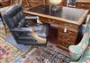 A late Victorian oak pedestal desk, bears Howard and Son stamp and plaque, together with a contemporary black W.150cm                  