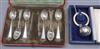 A cased set of George V silver teaspoons and tongs and a cased modern silver child's rattle.                                           