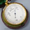 A 19th century gilt brass cased pocket barometer with compass, cased                                                                                                                                                        