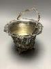 An early Victorian pierced silver sugar basket by the Barnards, London 1846, now with a later silver liner, London 1914, 12.5oz.                                                                                            