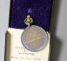 A WWI Queen Mary Christmas box, two National reserve London enamelled badges and two college medals to G. Lovegrove                                                                                                         