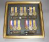 Five WW1 medal groups in one display case                                                                                                                                                                                   