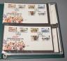 Seven albums of Jersey and Guernsey first day covers                                                                                                                                                                        