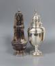 A George V silver baluster sugar caster, London, 1926, 18.5cm and a later silver octagonal sugar caster, 13.5oz.                                                                                                            