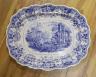 A large Victorian blue-printed stone china meat plate depicting 'Venetian scenery' - 54cm long                                                                                                                              