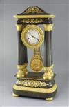 A mid 19th century French bronze and ormolu portico clock, height 25in.                                                                