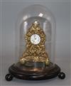 A 19th century brass timepiece under a glass dome clock 10cm high                                                                      