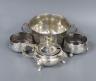 A silver sugar bowl, pair of silver bun salts and a silver mustard pot.                                                                                                                                                     