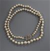 A single strand cultured pearl necklace with diamond set white metal clasp, 41cm.                                                      