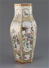 A Chinese famille rose 'mandarin' hexagonal baluster vase, Qianlong period, H. 37.4cm, slight restoration to rim                       