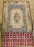 A 20th century wool worked floral rug and a woven Welsh blanket                                                                                                                                                             