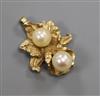 A 14ct gold and cultured pearl set pendant, 22mm.                                                                                      