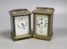 A French brass carriage timepiece with alarm and a French brass carriage timepiece, Tallest 11.5 cms high.                                                                                                                  
