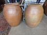 A pair of large terracotta garden planters, height 88cm                                                                                                                                                                     