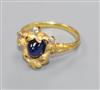 An early 20th century French? yellow metal, cabochon sapphire and diamond set dress ring, size L.                                      