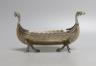 A Scandinavian? white metal model of a Viking ship, length 21.8cm, 7oz.                                                                                                                                                     