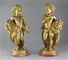 A pair of late 19th century French ormolu figures of putti, height 20.25in.                                                            