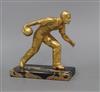 An Art Deco gilt metal figure of a bowls player, on marble base height 18cm                                                            