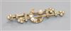 An early 20th century yellow metal, seed pearl and diamond set "crescent & moon" bar brooch, 45mm.                                     