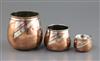 A graduated set of three Christofle Dinanderie Luc Lanel silver inset copper vases, tallest 4in.                                       