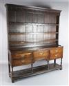 A George III oak dresser, W.6ft 3in. D.1ft 3in. H.6ft 10in.                                                                            