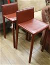 A pair of Bonaldo Italian leather bar stools                                                                                           