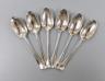A set of six 18th century silver Old English pattern dessert spoons, indistinct marks, maker SW, possibly London, 1737, 16.5cm, 154 grams.                                                                                  
