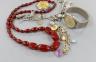 Mixed jewellery including charm bracelet, simulated cherry amber necklace etc.                                                                                                                                              