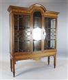 An Edwardian inlaid mahogany display cabinet, W.5ft 1in. D.1ft 6in. H.6ft 5.5in                                                        