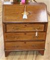 An Edwardian inlaid mahogany bureau                                                                                                    