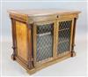 A fine quality early Victorian walnut and birds eye maple library cabinet, W.4ft D.2ft 6in. H.3ft 2in.                                 